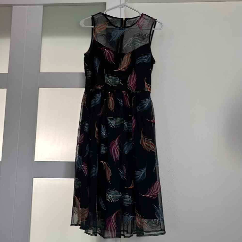 Calvin Klein size 6 colorful mid calf length dress.